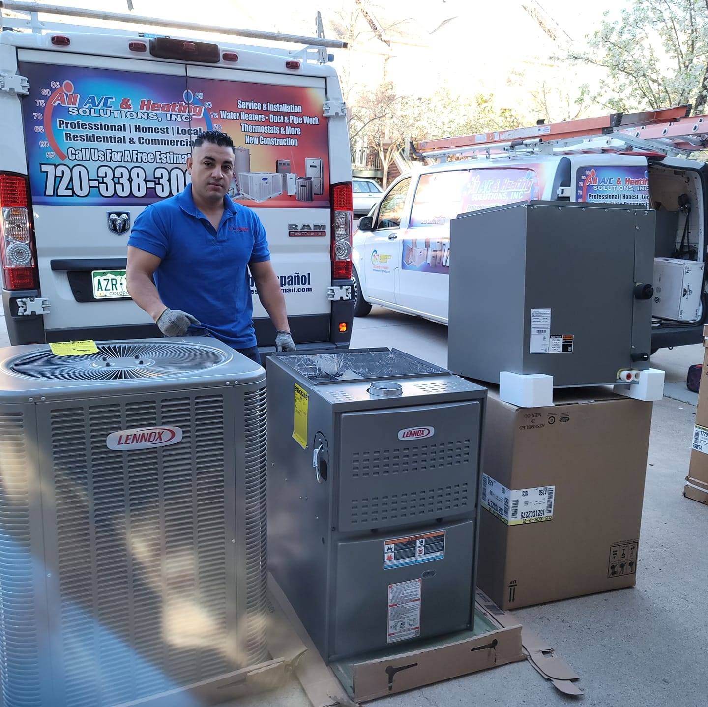 All A/C & Heating Solutions service team and vans